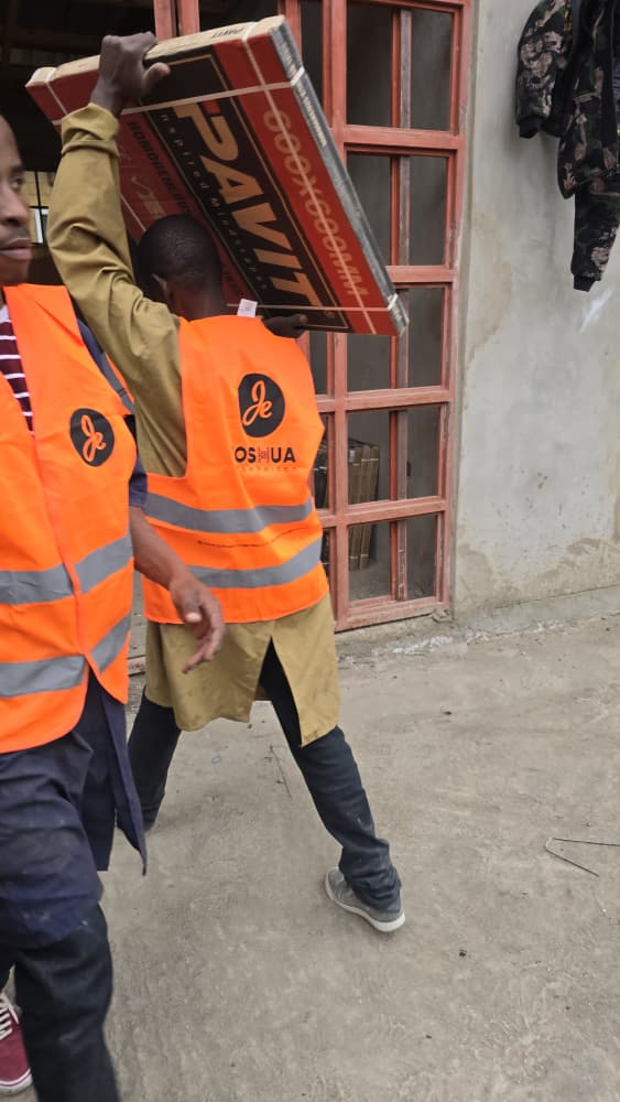 Workers carrying materials